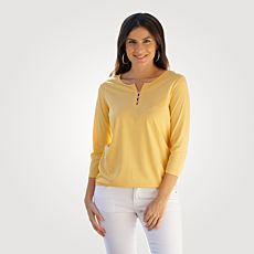 Blouse à pois à manches 3/4 avec encolure en V