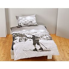 Linge de lit avec skieur nostalgique