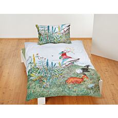 Linge de lit avec Flurina sur fond de prairie printanière