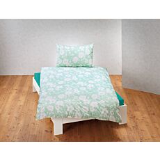 Linge de lit avec motif floral blanc sur fond coloré
