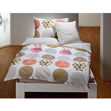 Linge de lit avec différents motifs de cercles et de fleurs