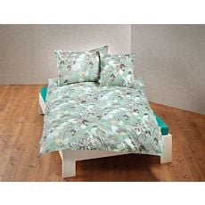 Linge de lit avec motif naturel sur fond vert clair