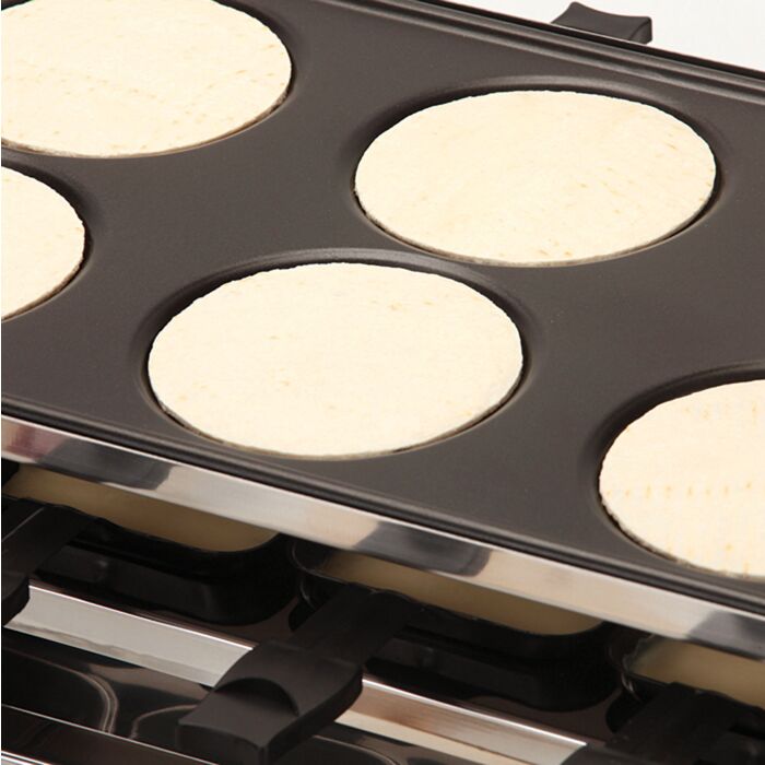 Four/gril à raclette Ohmex 3-en-1, pour 8 personnes