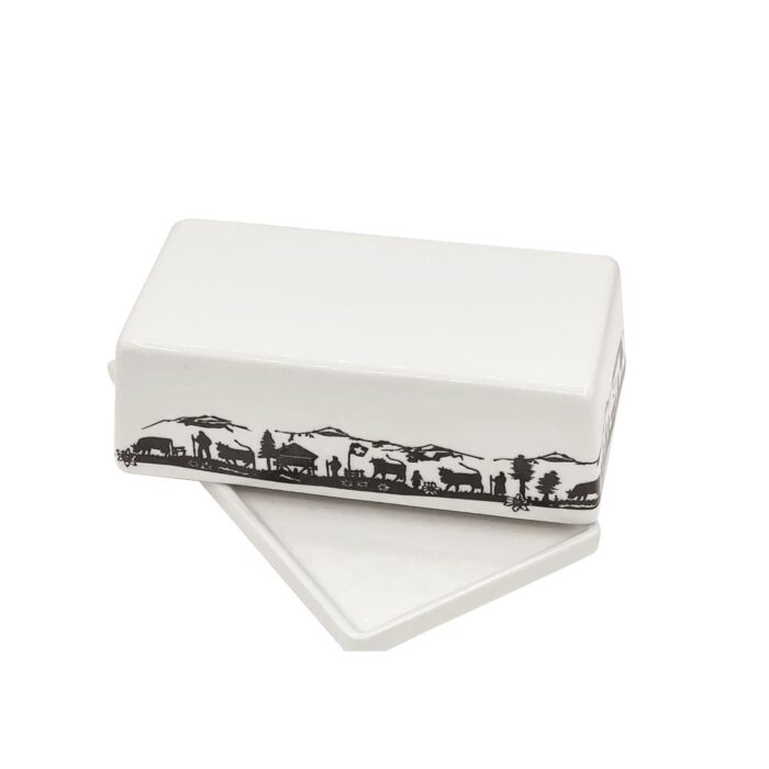 Beurrier en porcelaine avec motif de papier découpé Montée à l'alpage
