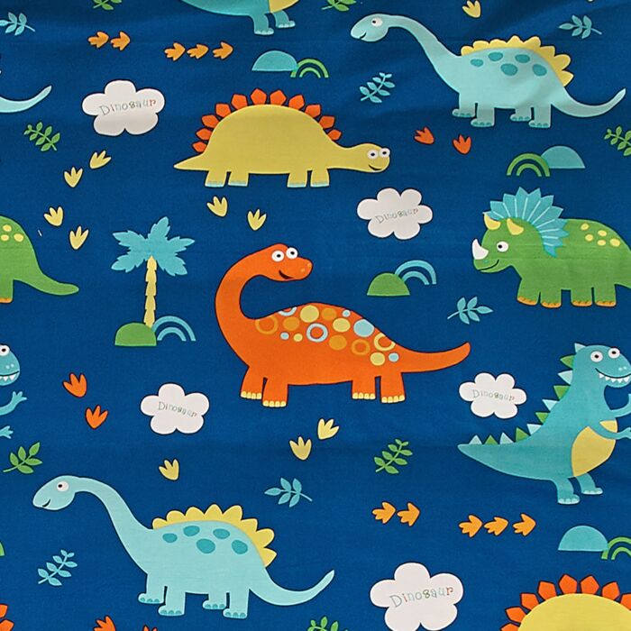 Linge de lit orné de charmants dinos colorés