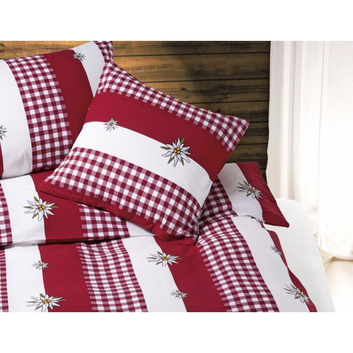 Linge de lit rouge et blanc avec edelweiss