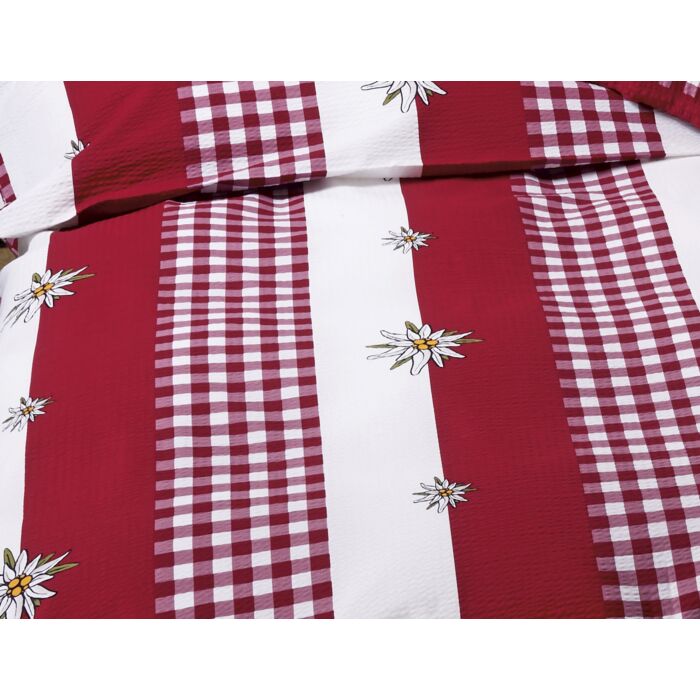 Linge de lit rouge et blanc avec edelweiss