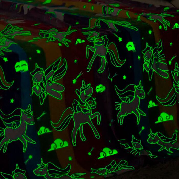 Couverture polaire Licornes à effet luminescent dans l'obscurité