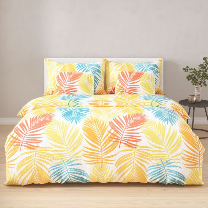 Linge de lit orné de feuilles de palmier