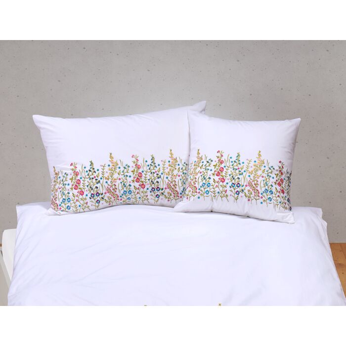 Linge de lit brodé de fleurs multicolores