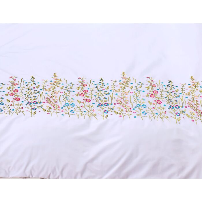 Linge de lit brodé de fleurs multicolores