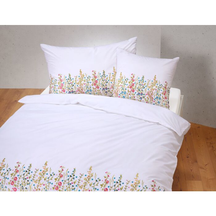 Linge de lit brodé de fleurs multicolores