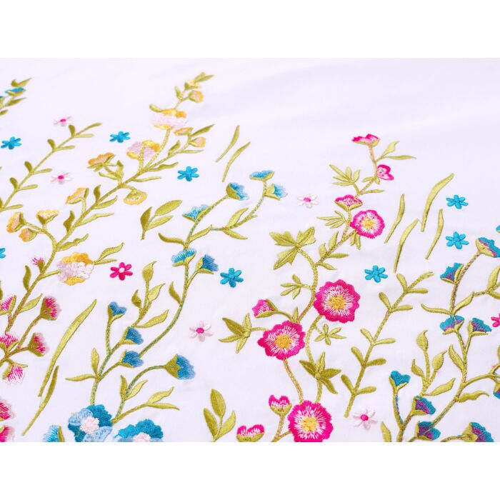 Linge de lit brodé de fleurs multicolores