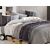 Linge de lit orné de pois et de bandes transversales