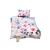 Linge de lit avec branches fleuries