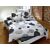 Linge de lit avec motif de cercles gris et noirs sur fond blanc